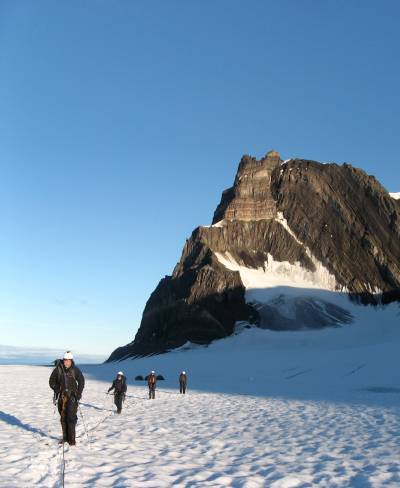 climbers crossing glacier