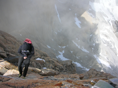 climber abseiling rappelling