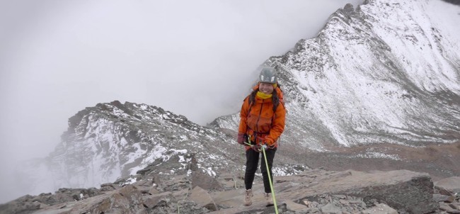 climber abseiling rappelling
