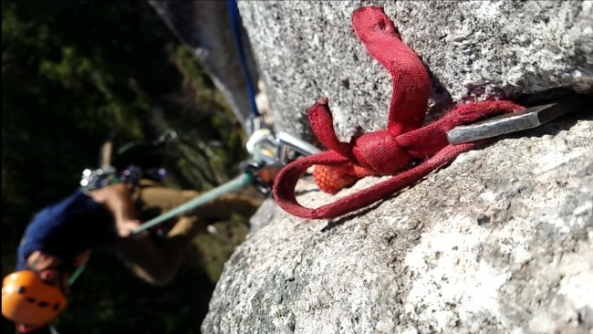 water knot tying webbing for rock climbing